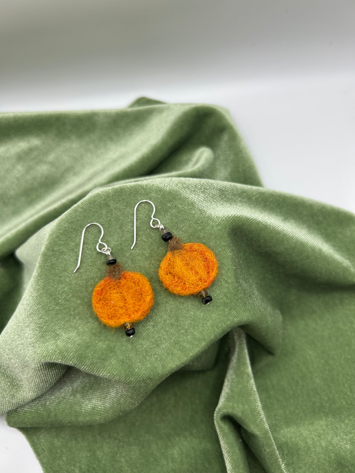Pumpkin felt with Tourmaline and labradorite