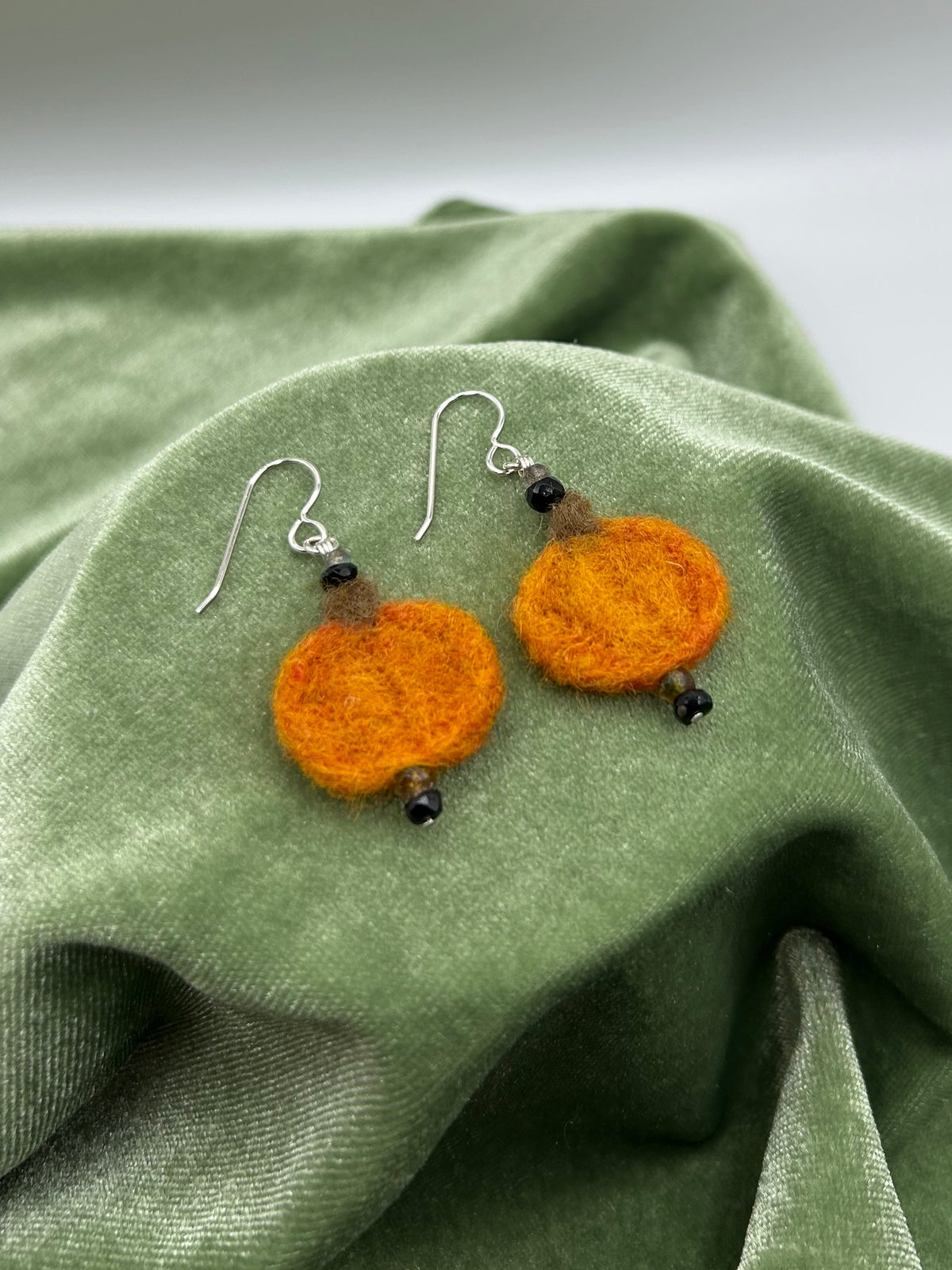 Pumpkin felt with Tourmaline and labradorite
