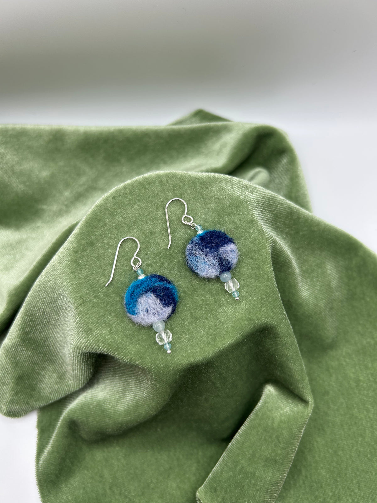 Blue round felt earrings with natural Arkansas ice crystal, morganite, apatite