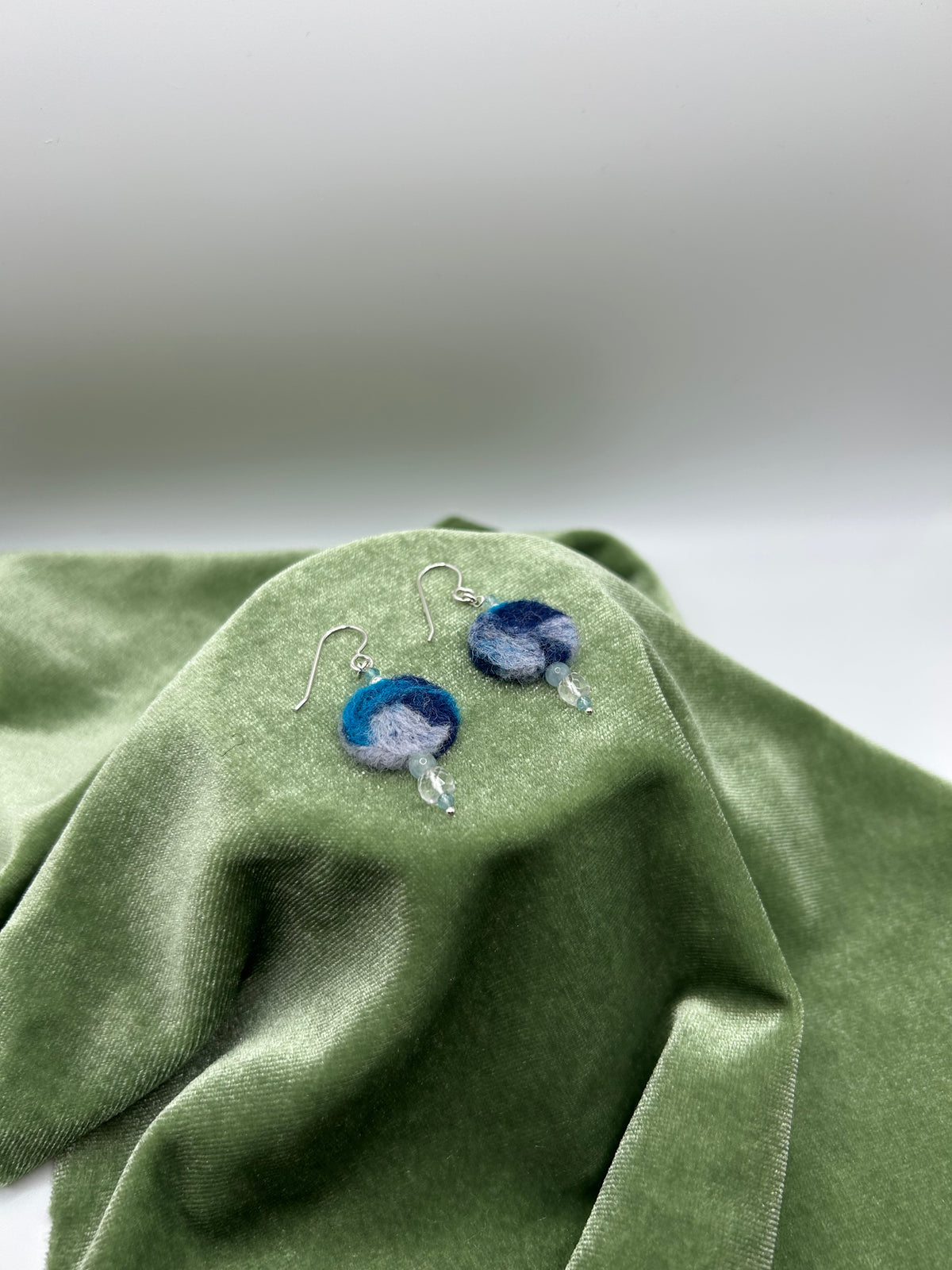 Blue round felt earrings with natural Arkansas ice crystal, morganite, apatite