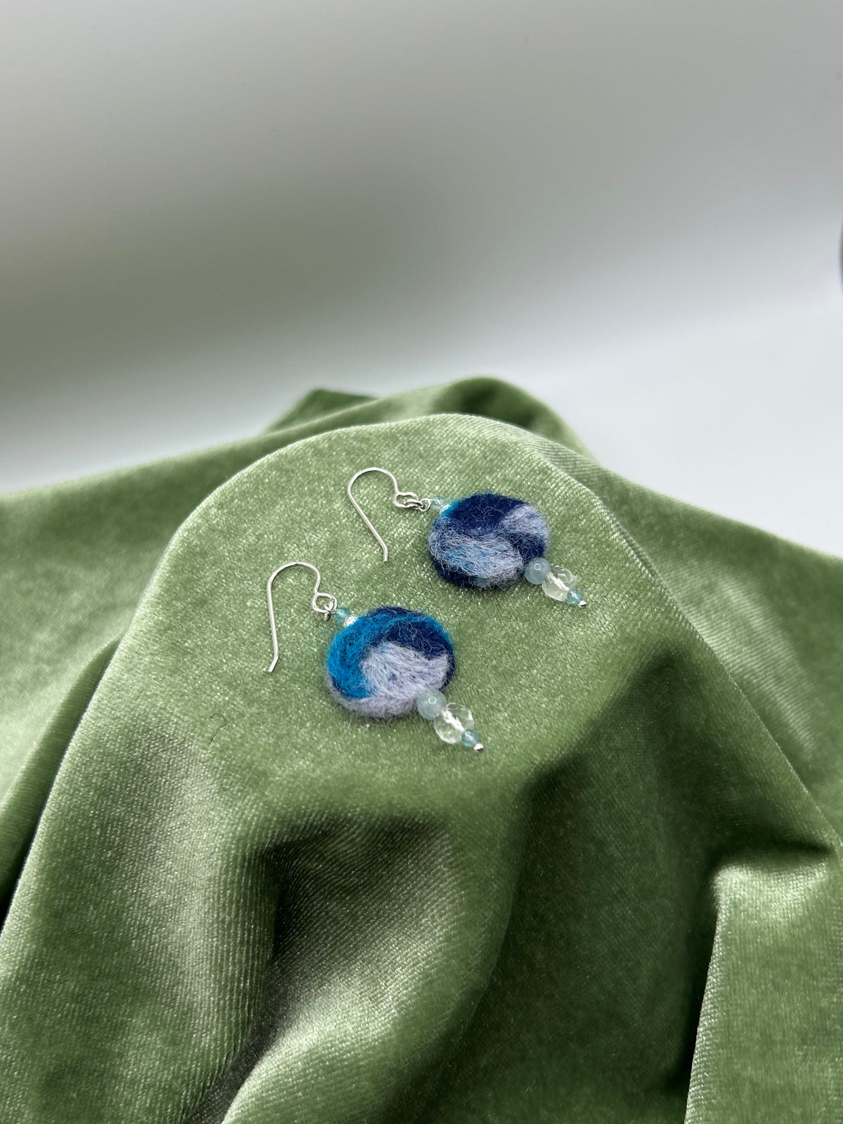 Blue round felt earrings with natural Arkansas ice crystal, morganite, apatite